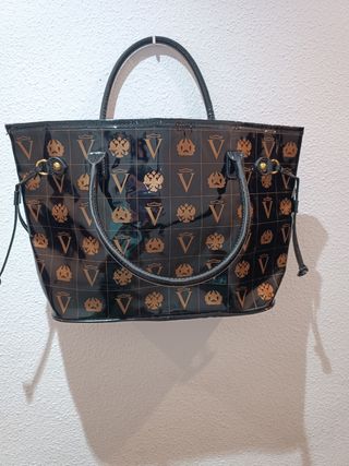 Bolso de mano mujer negro y dorado