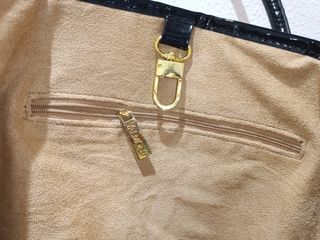 Bolso de mano mujer negro y dorado
