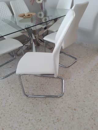 Mesa de salón cristal y 6 sillas diseño