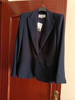 Americana El Corte Inglés azul talla M
Con funda.