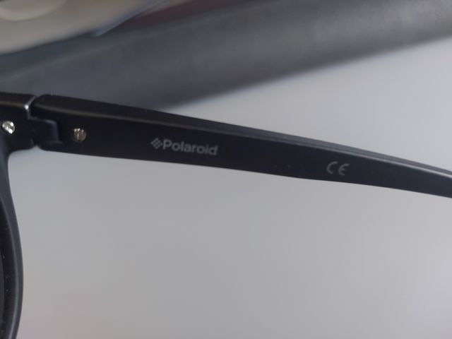 Occhiali da sole Polaroid neri e rosa