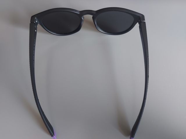 Occhiali da sole Polaroid neri e rosa