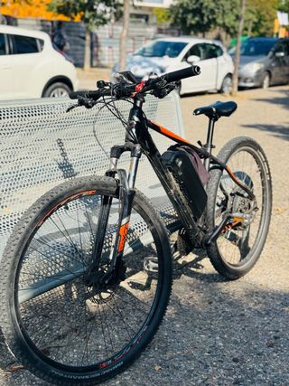 Bicicleta Eléctrica Negra y Naranja