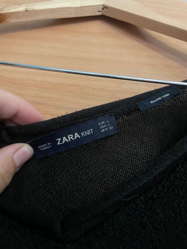 Blusa negra con perlas