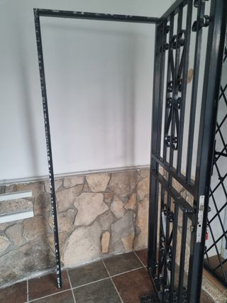 Puerta de hierro forjado