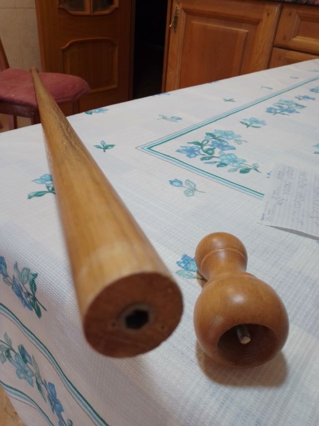 Barra de madera con terminales