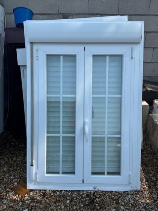 VENTANA OSCILOBATIENTE CLIMALIT CON BARROTILLO.