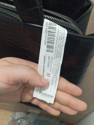 Bolso negro efecto piel de serpiente