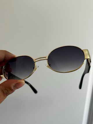 Occhiali da sole ovali vintage dorati