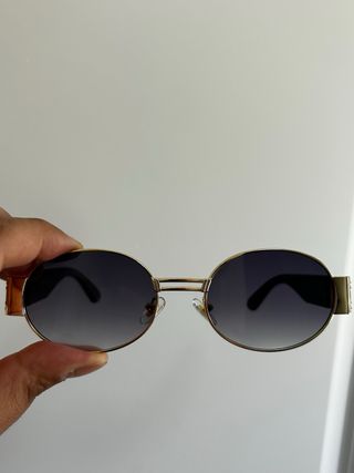 Occhiali da sole ovali vintage dorati