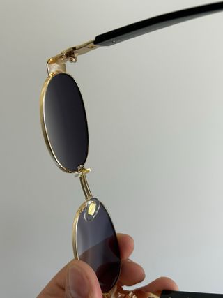 Occhiali da sole ovali vintage dorati