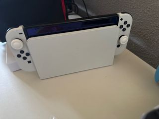 Nintendo Switch OLED Blanca y Negra tengo la caja 