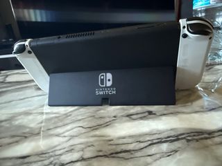 Nintendo Switch OLED Blanca y Negra tengo la caja 