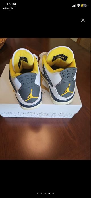 Jordan 4 Blanco y Amarillo
