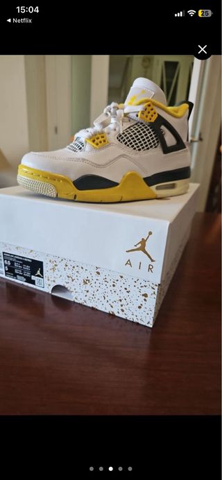 Jordan 4 Blanco y Amarillo