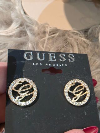 Pendientes Guess G dorados y plateados