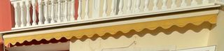 Toldo de pared con brazos