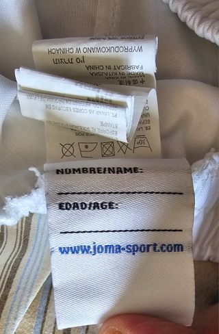 Pantaloncini bianchi Joma ragazzo n.15