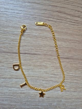 Pulsera Dior.