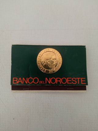 Cerillas Banco del Noroeste con moneda
