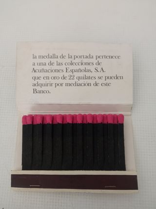 Cerillas Banco del Noroeste con moneda