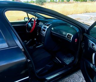 Peugeot 407 2008 o cambio coche pequeño
