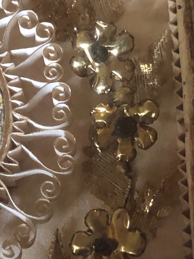 Marco de devoción con imagen religiosa