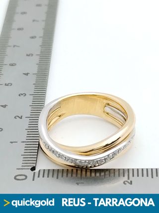 035-01-00654 ANILLO ORO DE 18K BANDA T15