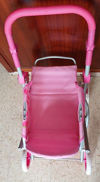 Carrito de bebé plegable de juguete rosa