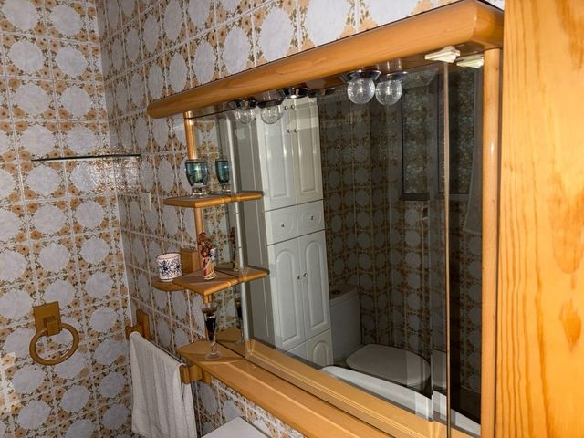 Mueble de baño madera.