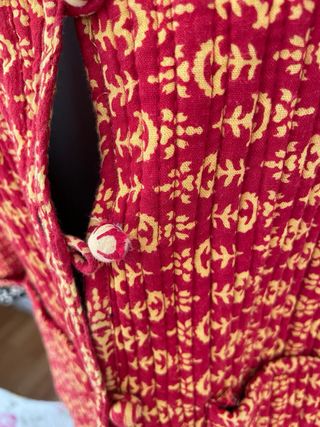 Chaqueta acolchada reversible botones y bolsillos