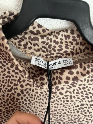 Top estampado animal print leopardo manga larga