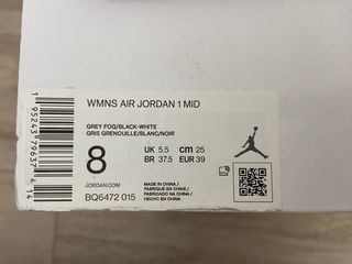 Zapatillas Nike Jordan 1 Mid Gris y Blanco