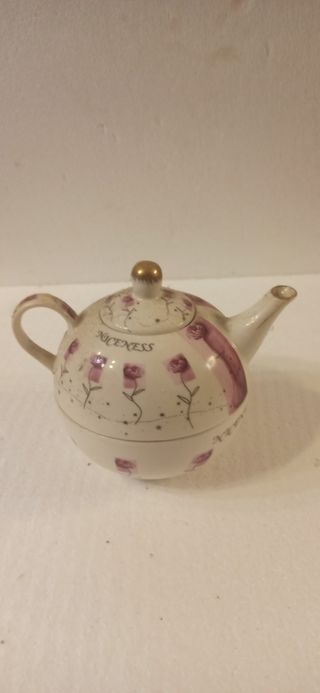 Teiera in porcellana decorata