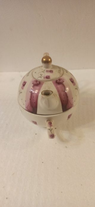 Teiera in porcellana decorata