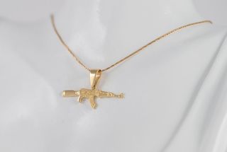 Colgante de oro 18k 750