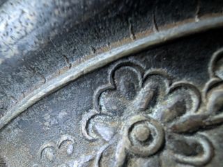 Mortaio antico in bronzo decorato