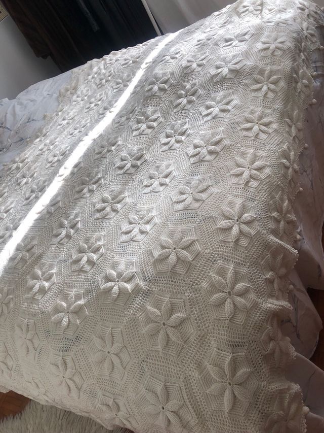 Colcha hecha a mano de perlé