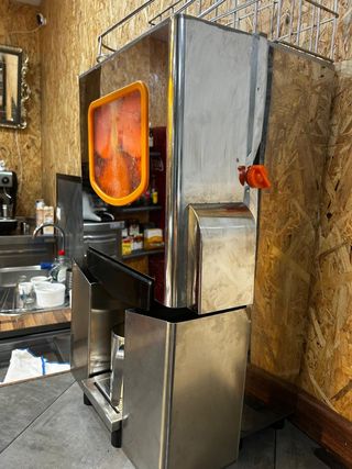 Exprimidor automático de naranjas