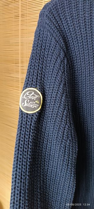 Jersey Quiksilver azul cuello alto botones