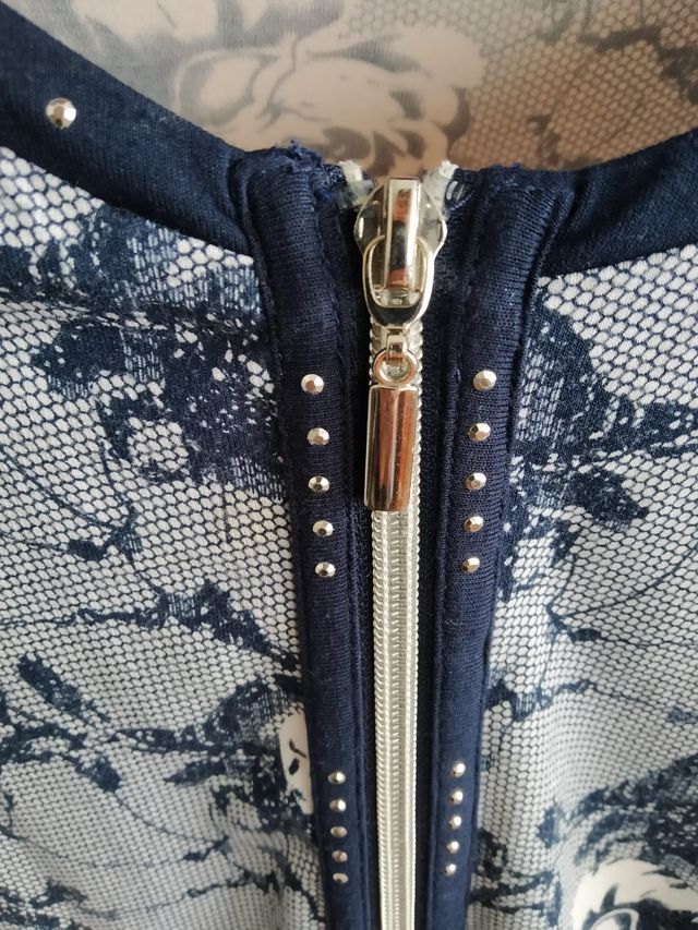 Cárdigan con cremallera y estampado floral