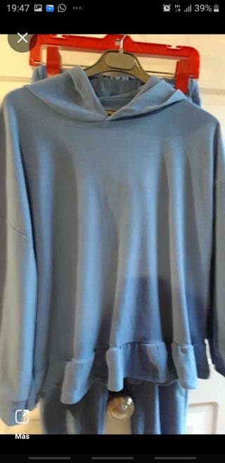 Tuta sportiva in pelle blu pesca
