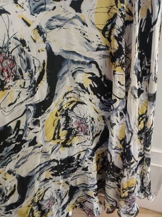 Vestido de fiesta dorado y negro con chaqueta