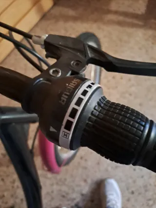 Bicicleta niña negra y rosa