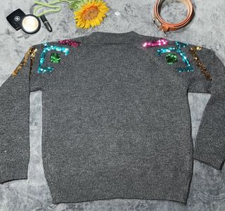 Jersey de punto con lentejuelas