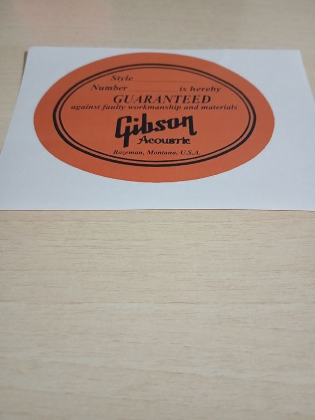 Etiqueta Gibson guitarra acústica restaurar