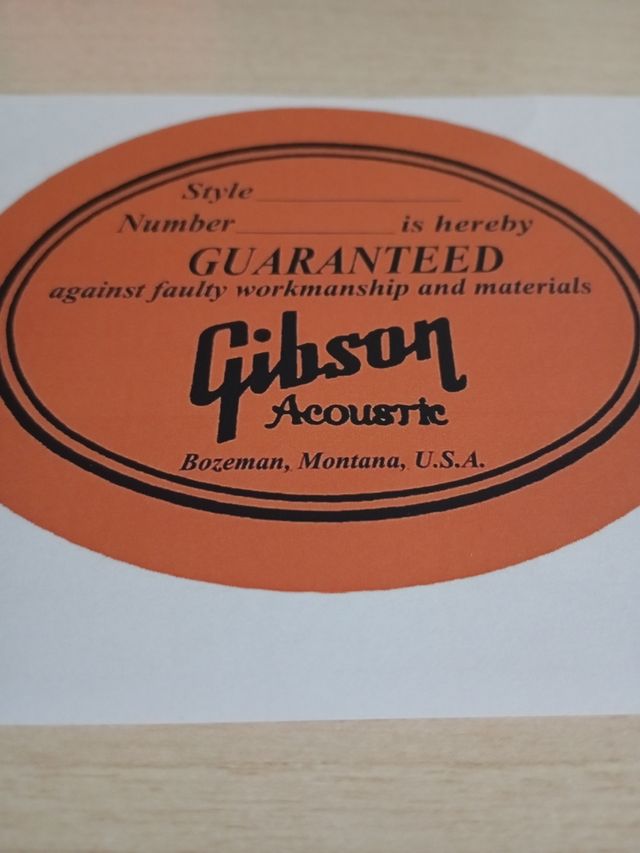Etiqueta Gibson guitarra acústica restaurar