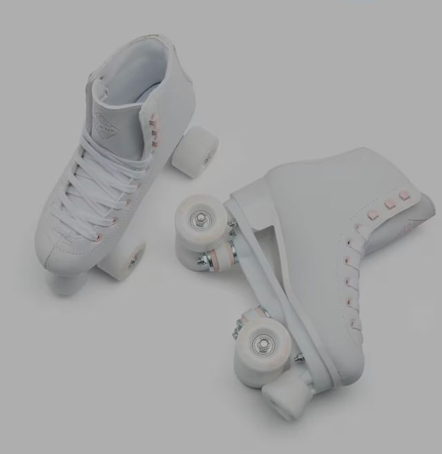 Pattini a rotelle in pelle bianchi