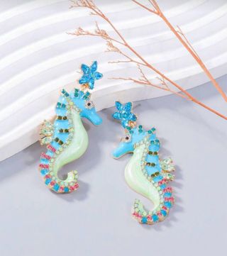 Pendientes de caballito de mar con estrellas