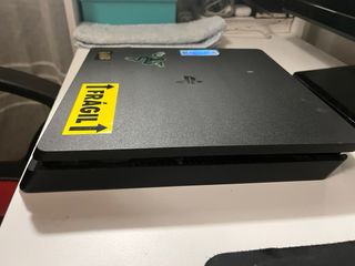 PS4 Slim 1TB + Mando Negro + Auriculares Razer